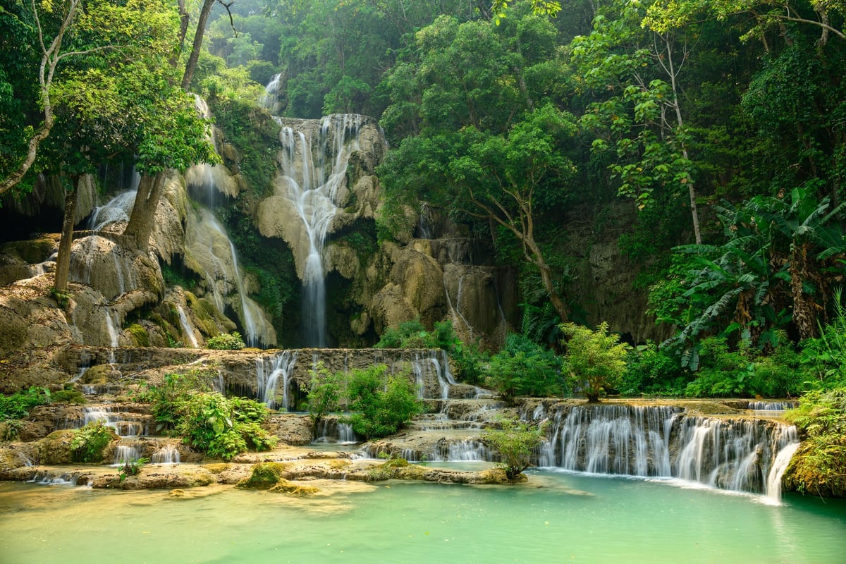 Cascading limestone waterfall with terraced pools at Dunn's River Falls, Ocho Rios